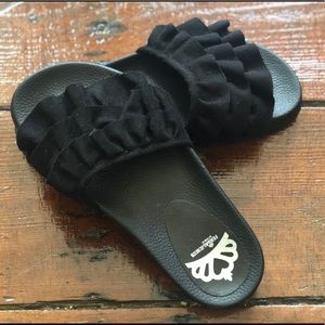 Black ruffle Fergalicious Sandals